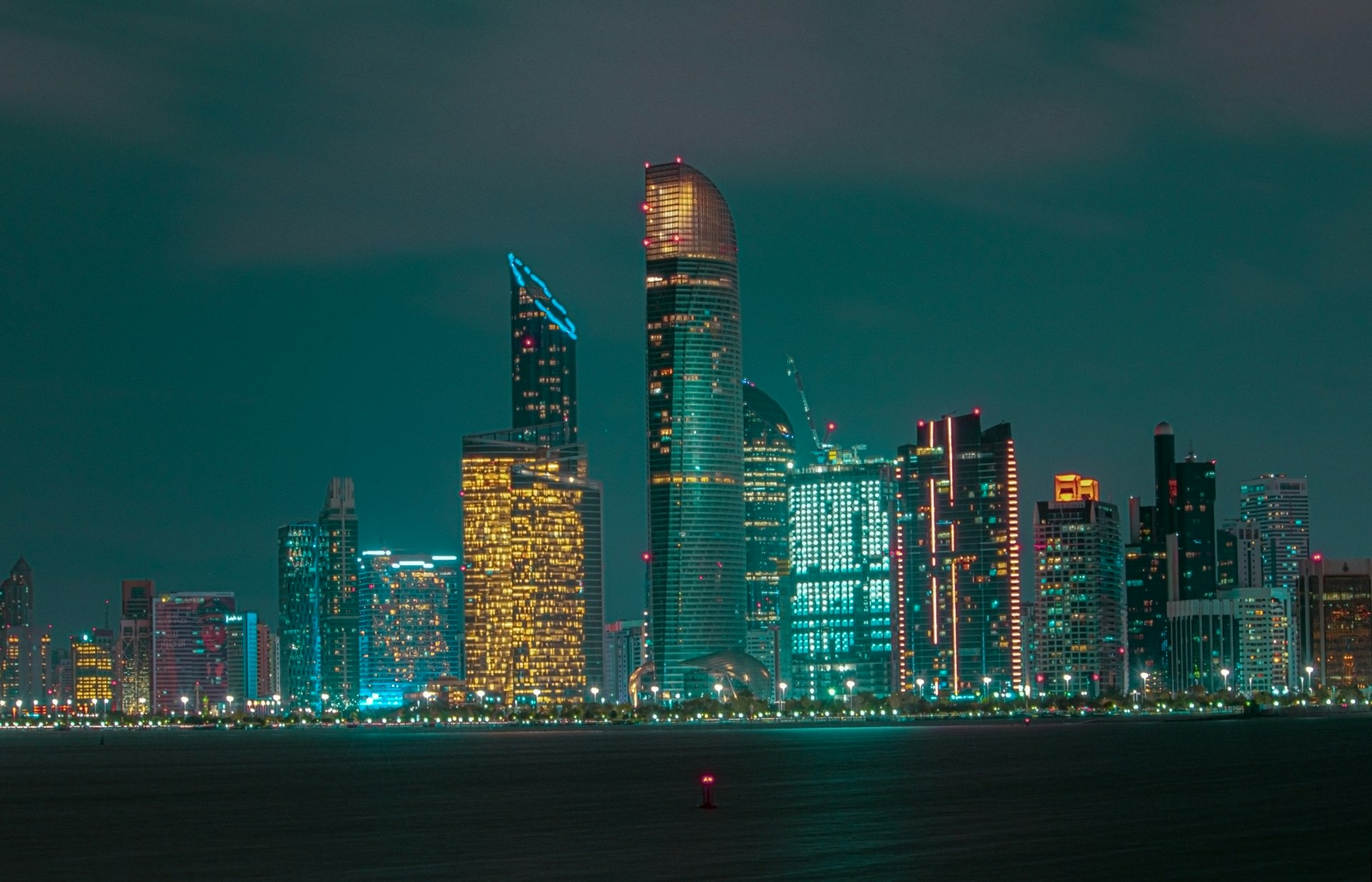 city skyline during night time